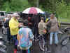 trying to stay warm at finish.JPG (102287 bytes)